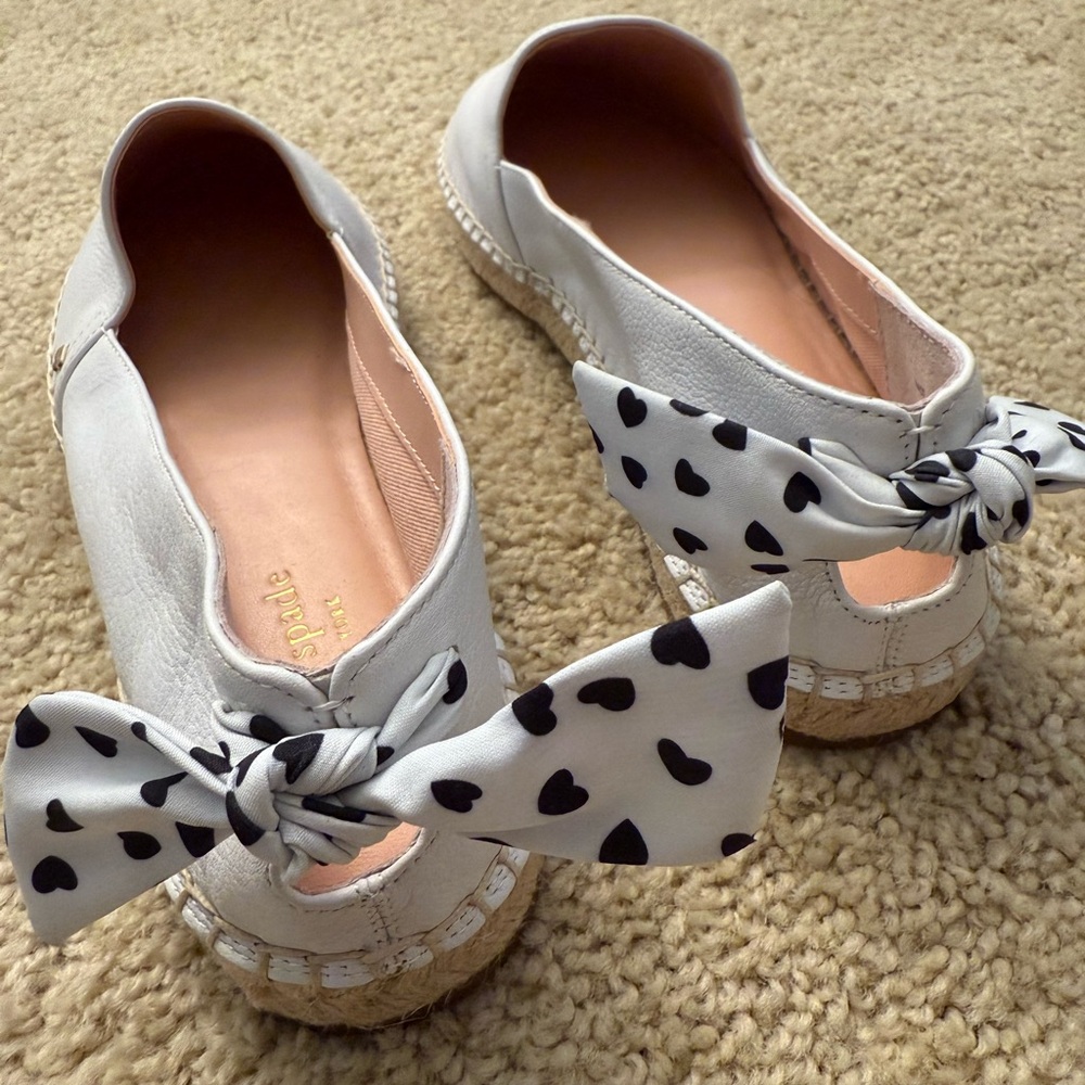 Never worn Kate Spade white espadrilles. Size 10.